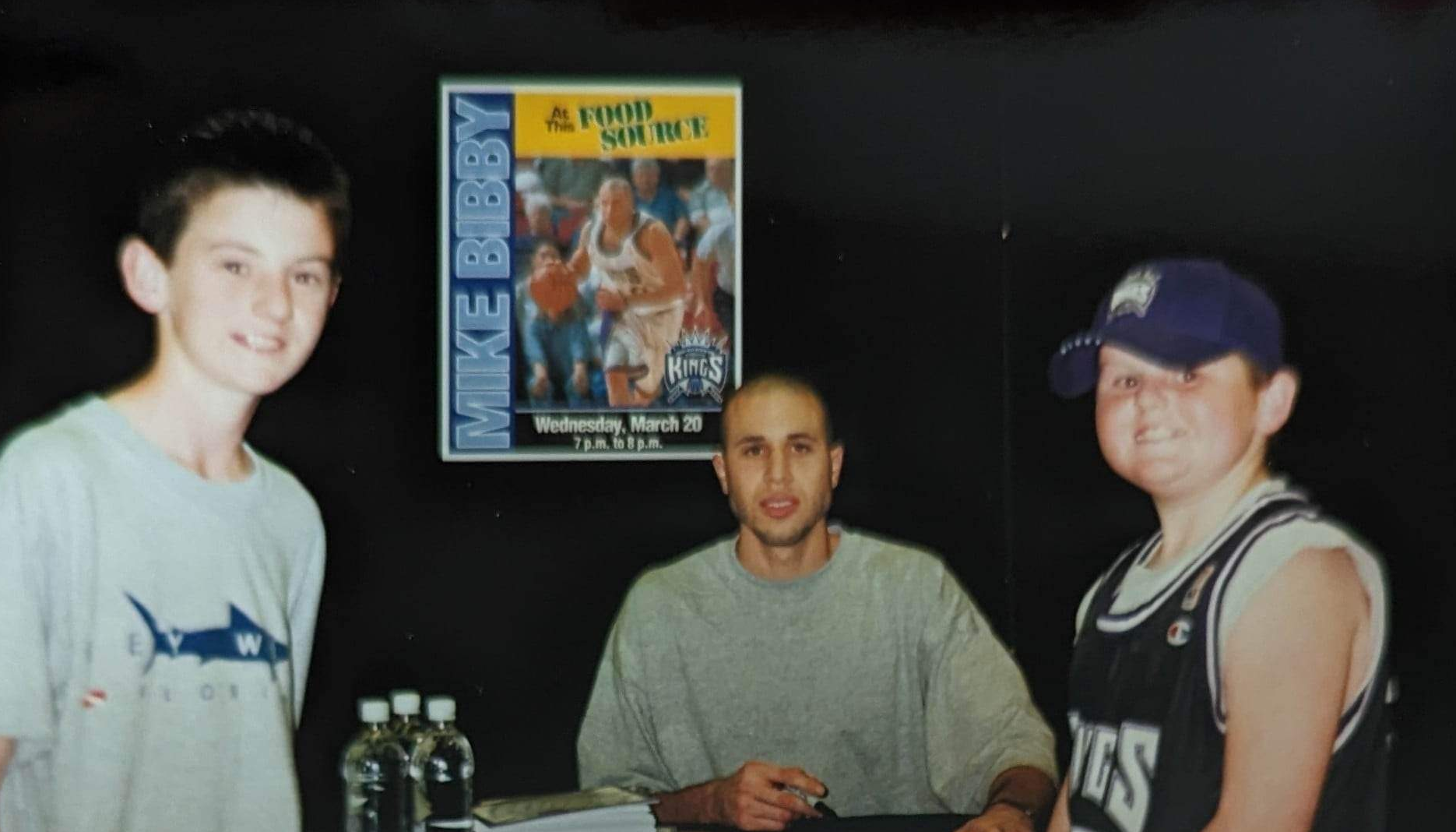 Getting Bibby's autograph